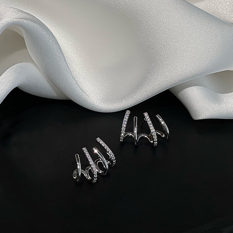 Four - clawed ear row studs E119